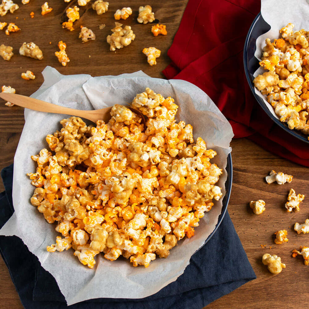 Delicious Butter & Cheese Popcorn Close-Up - Perfect Movie Night Wallpaper