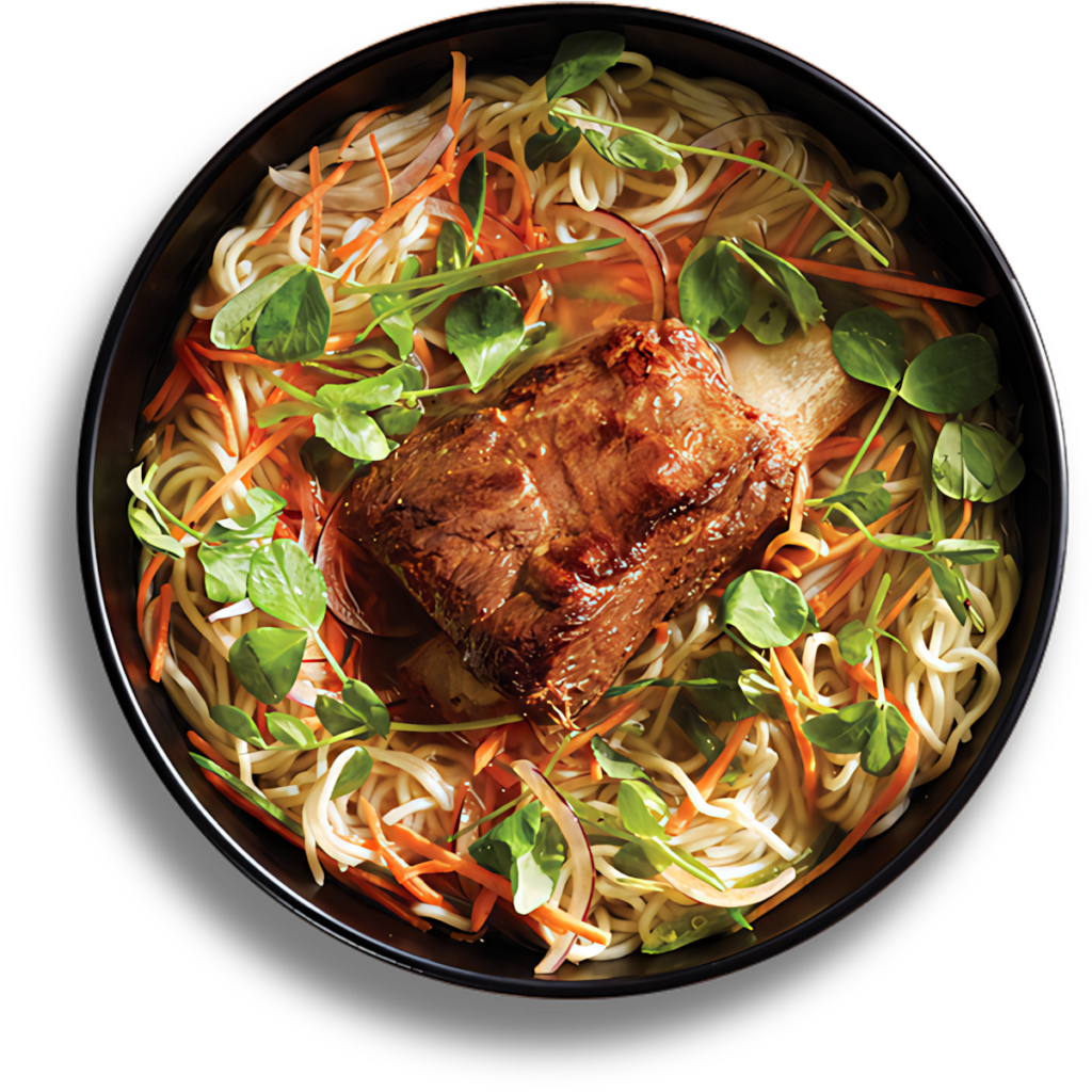 Delicious Pork-Topped Noodle Soup Wallpaper: Savory Broth & Fresh Greens