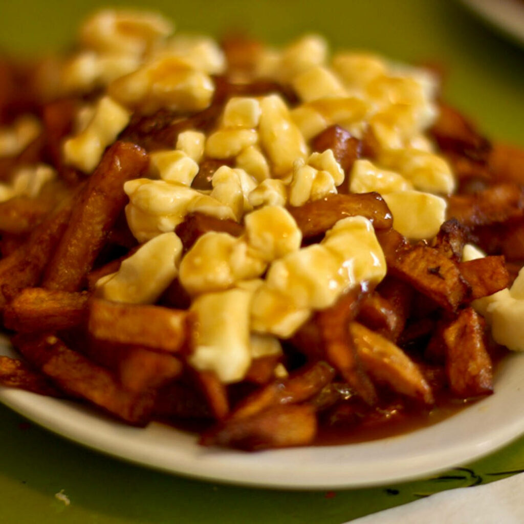 Delicious Poutine Wallpaper: Crispy Fries & Cheese Curds Delight