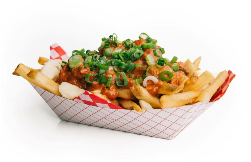 Delicious Poutine: Crispy Fries, Gravy & Cheese Curds Wallpaper