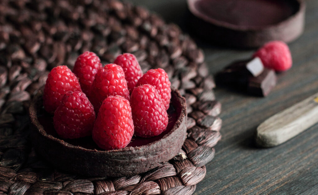 Vibrant Raspberry Dessert on Chocolate Biscuit - Stunning Wallpaper