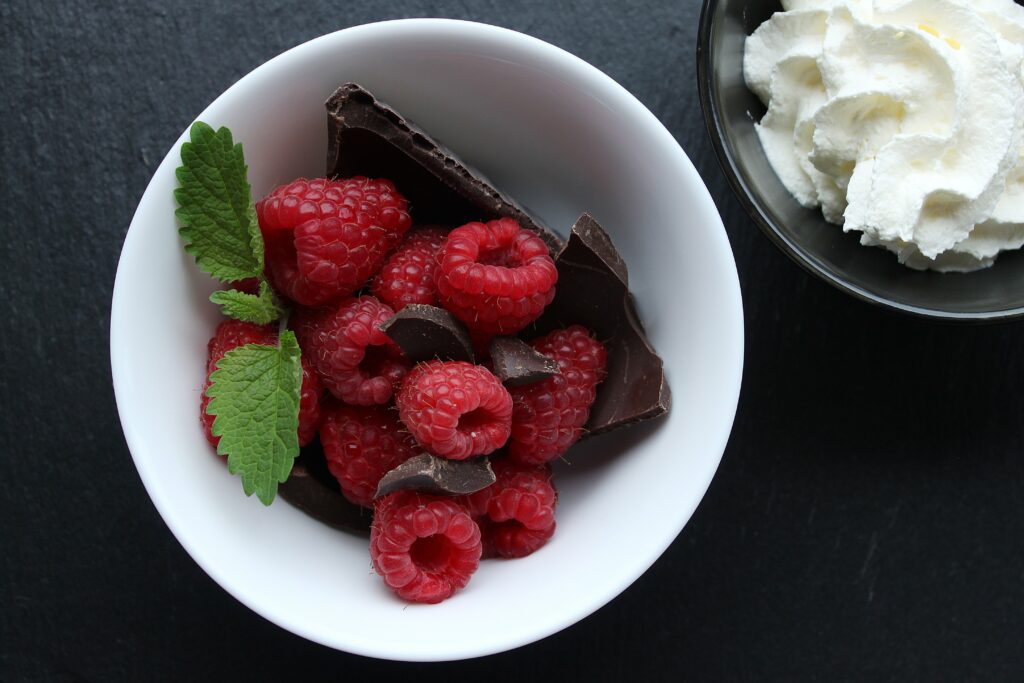 Indulgent Raspberry Chocolate Dessert in White Bowl - Wallpaper