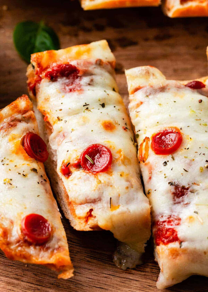 Delicious Rectangular Pizza Slices with Cheese & Pepperoni Wallpaper