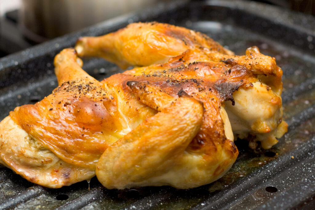 “Golden-Brown Roasted Whole Chicken Parrilla Wallpaper Background”