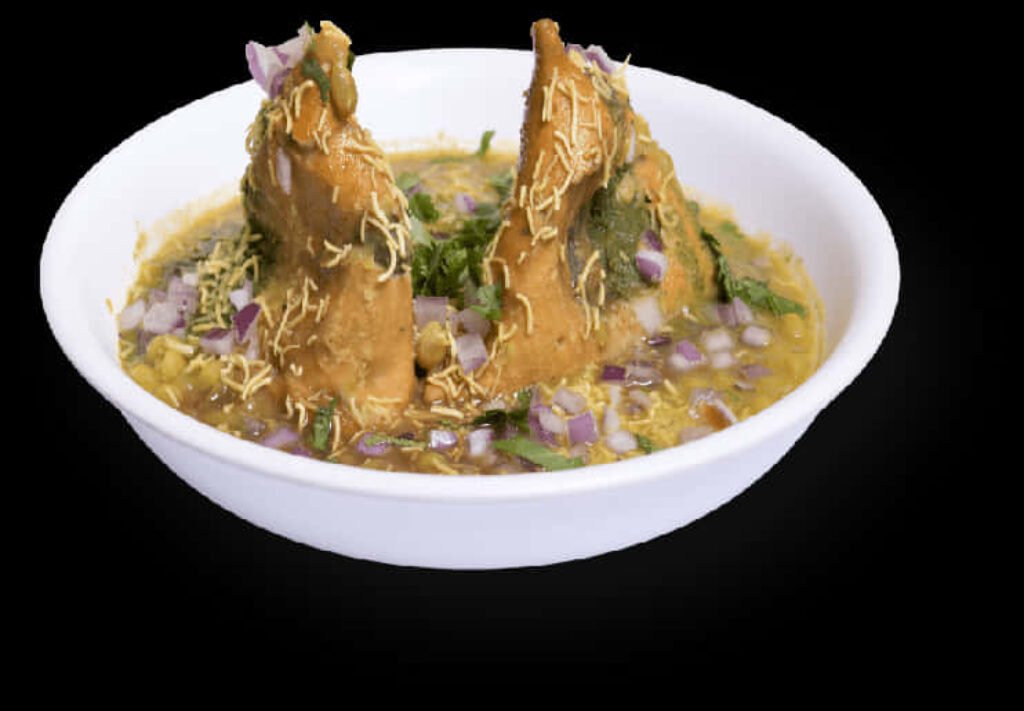 Delicious Samosa Chaat: Indian Appetizer in a Bowl Wallpaper