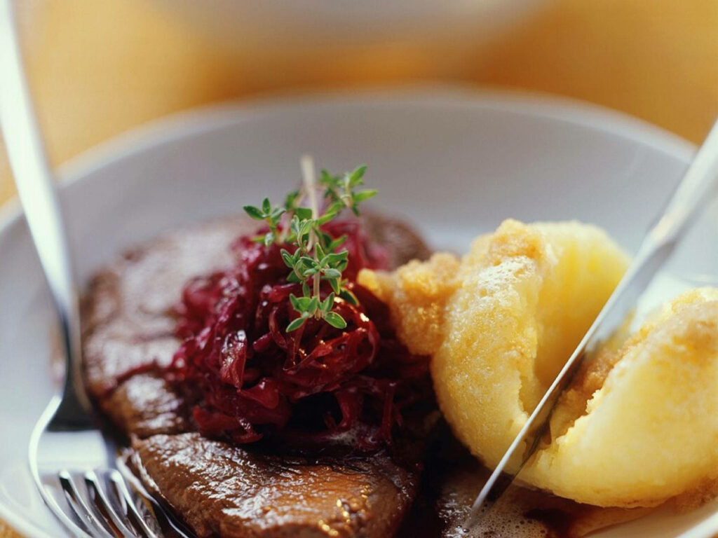 Sauerbraten Delight: Tender Red Cabbage & Dumplings Wallpaper