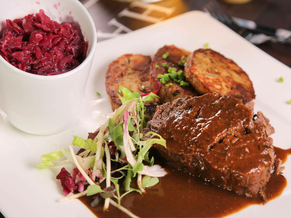 Delicious Sauerbraten with Red Cabbage & Roasted Potatoes Wallpaper