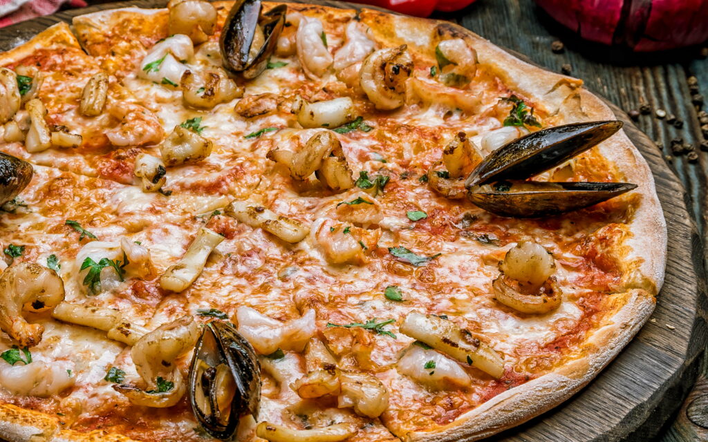 Savory Delights: Exploring the World of Seafood Pizzas in Stunning 4K Wallpaper