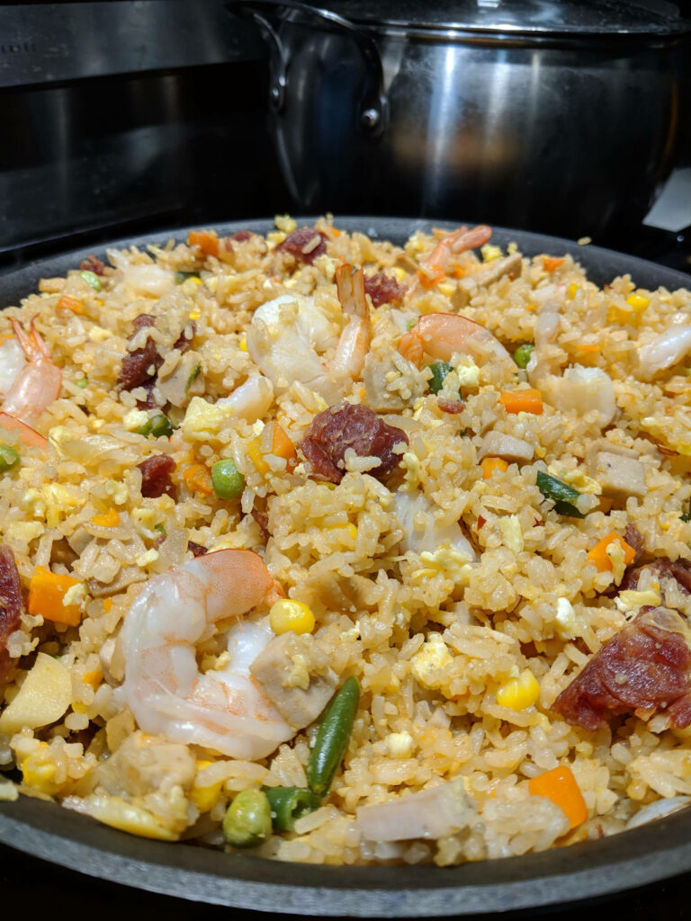 Delicious Shrimp Fried Rice Wallpaper: Flavorful Pan Dish Background