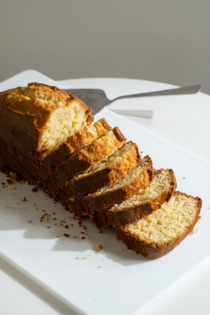 Delicious Sliced Bread on White Plate - Golden Crust Wallpaper