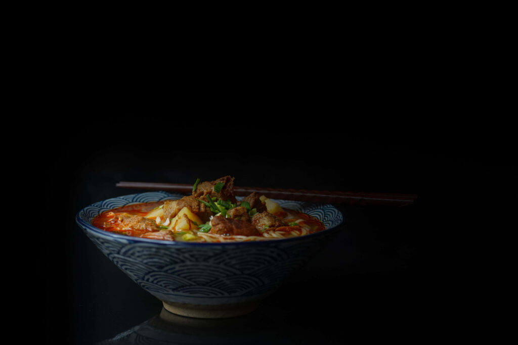Elegant Soup Bowl with Fresh Garnishes - Striking Wallpaper Background