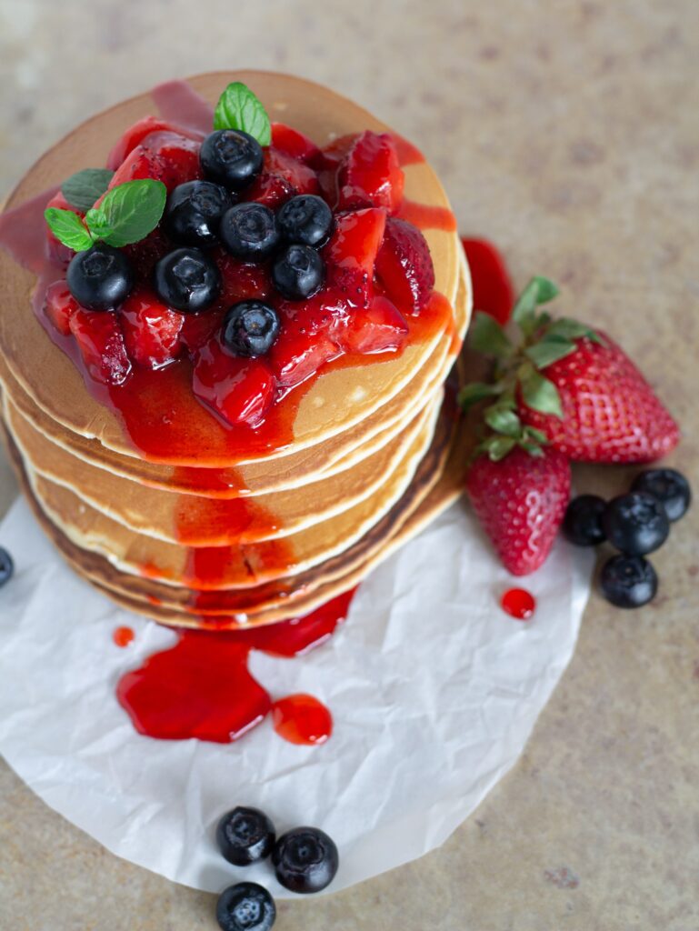 Delicious Golden Pancakes with Berries - Wallpaper Background