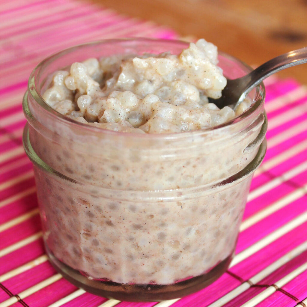 Delicious Creamy Tapioca Pudding Close-Up in a Glass Jar Wallpaper
