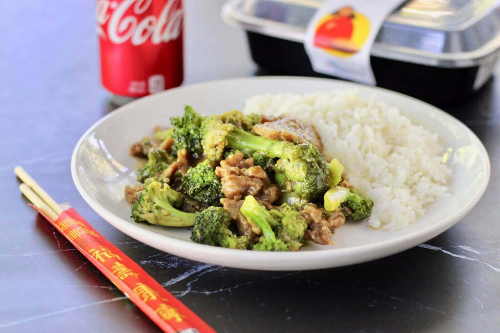 Stir-Fried Broccoli & Meat with Rice and Coca-Cola on Elegant Wallpaper