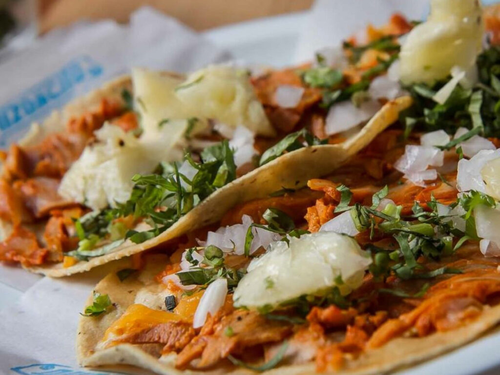 Delicious Tacos Al Pastor: Soft Tortilla with Onion & Pineapple Wallpaper