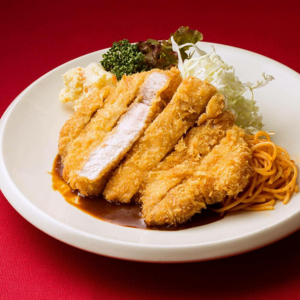 Tonkatsu Wallpaper: Delicious Dish with Spaghetti & Cabbage Background