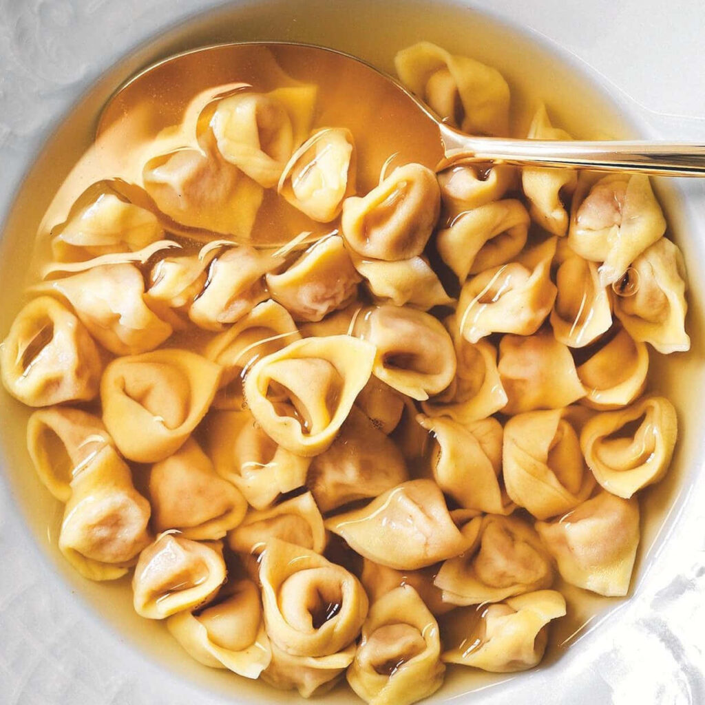 Delicious Tortellini in Brodo: Soft Pasta in Savory Broth Wallpaper