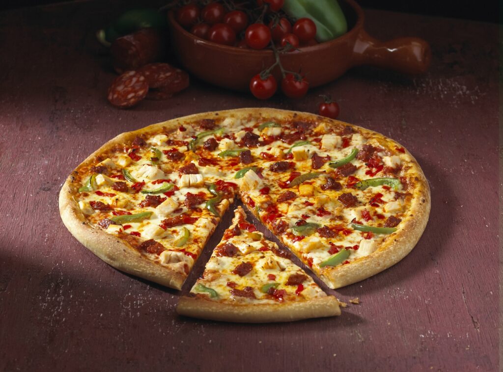 Delicious Vegetable Pizza Wallpaper: Fresh & Crispy Rustic Background
