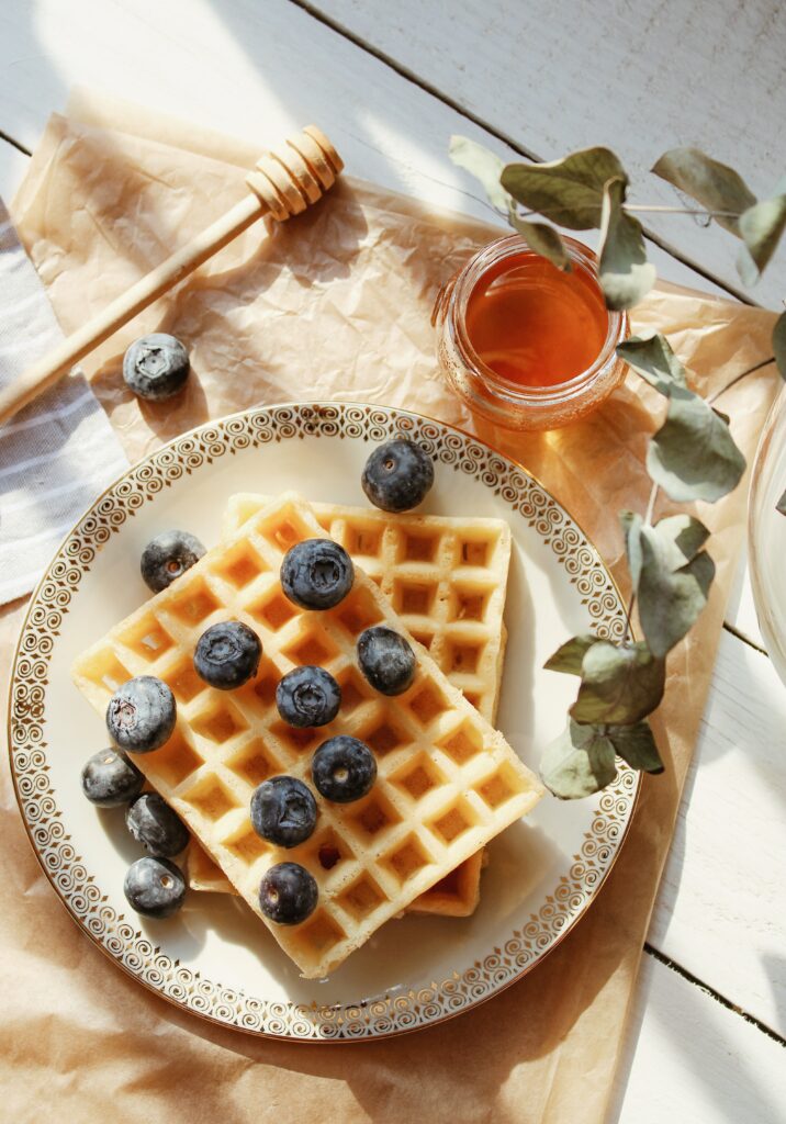 Delicious Viennese Waffles with Blueberries & Honey Wallpaper Background