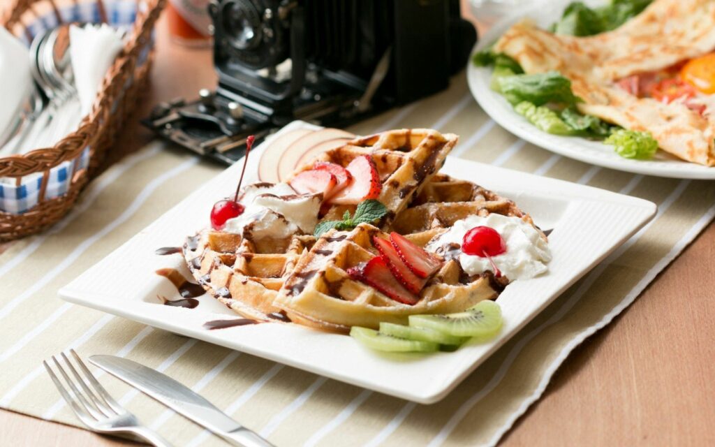 Delicious Dessert Wallpaper: Waffles with Strawberries & Chocolate