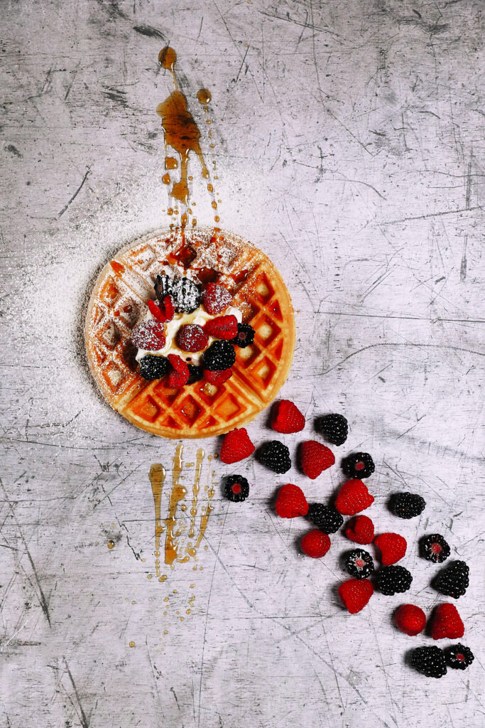 Inviting Waffle Dessert with Berries & Syrup – Wallpaper Background