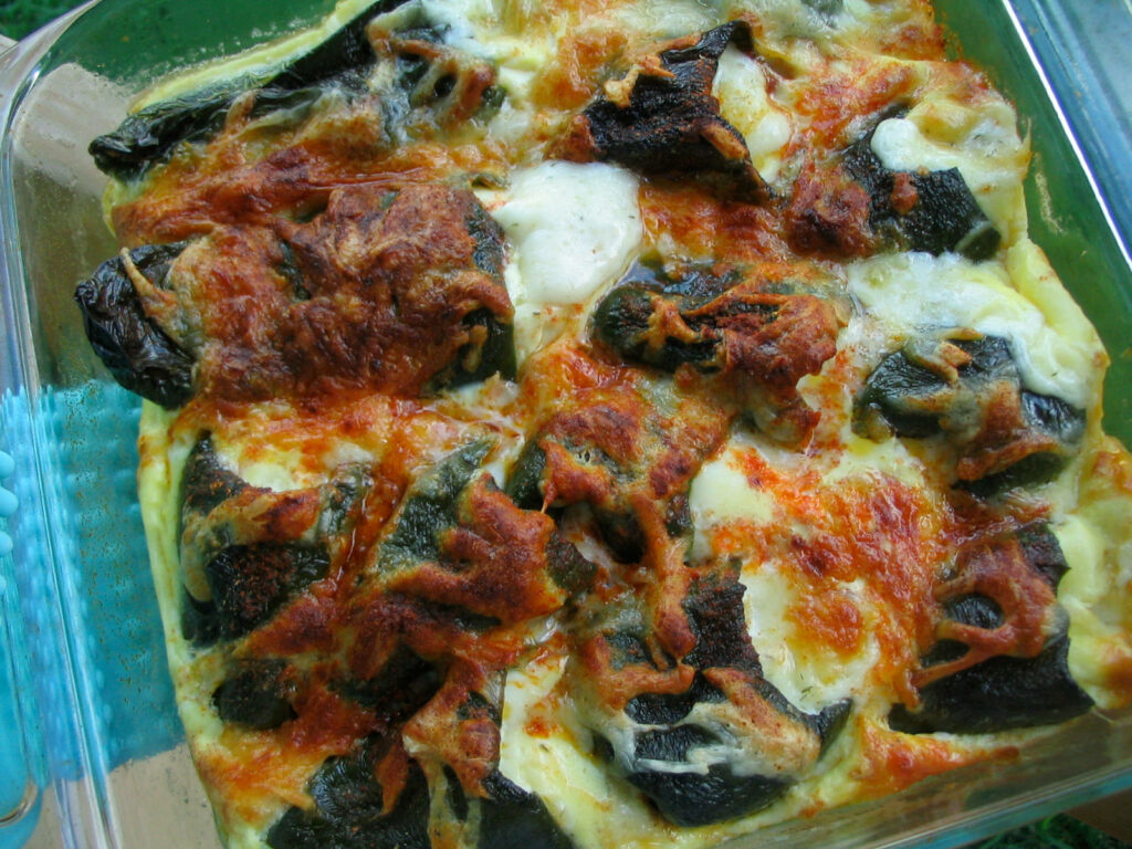 Delicious Mexican Chili Rellenos Wallpaper: Golden-Brown Cheese Delight