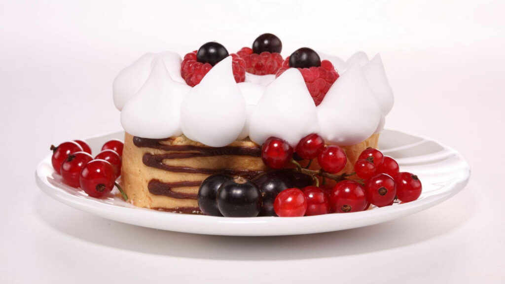Indulge in Delight: A Scrumptious Cake Dessert Adorned with Meringue and Berries - A Spectacular Background Image Wallpaper