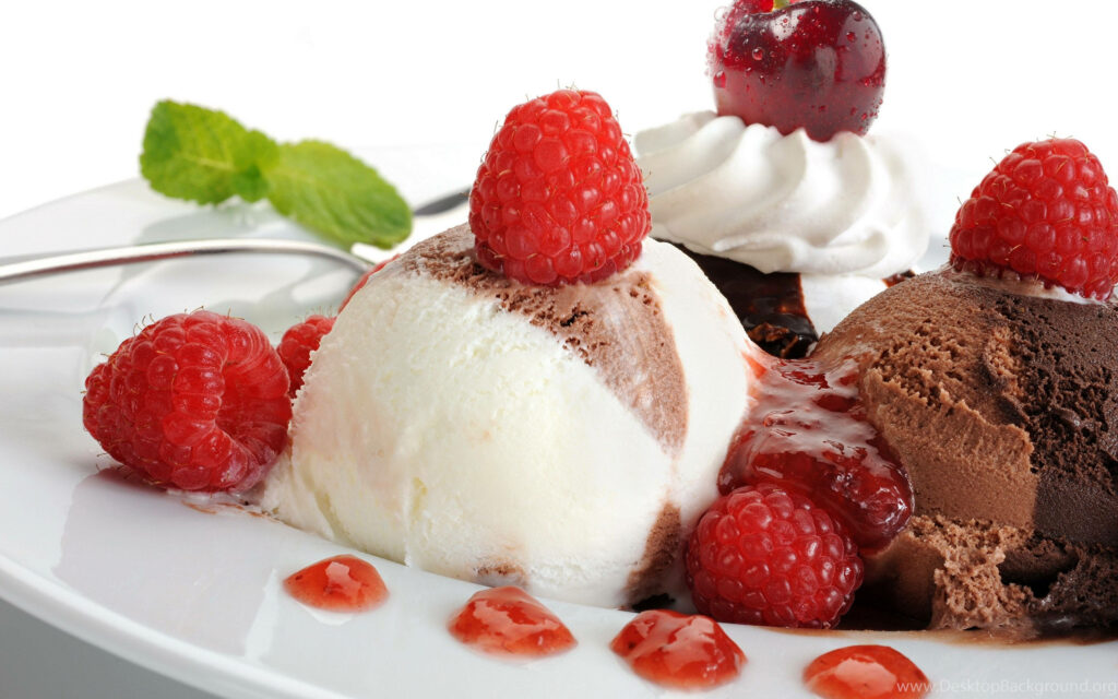 Deliciously Decadent Vanilla-Chocolate Ice Cream Delights Adorned with Bursting Raspberry and Cherry Delights in a Stylish Background Wallpaper