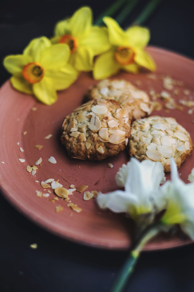 Fresh Almond Cookies on Peach Plate: Warm Springtime Wallpaper