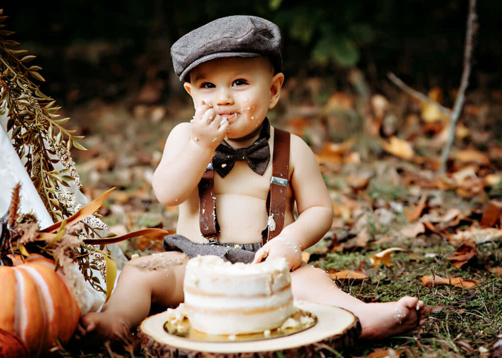 Charming Autumn Baby Cake Smash Photoshoot on Grass Wallpaper