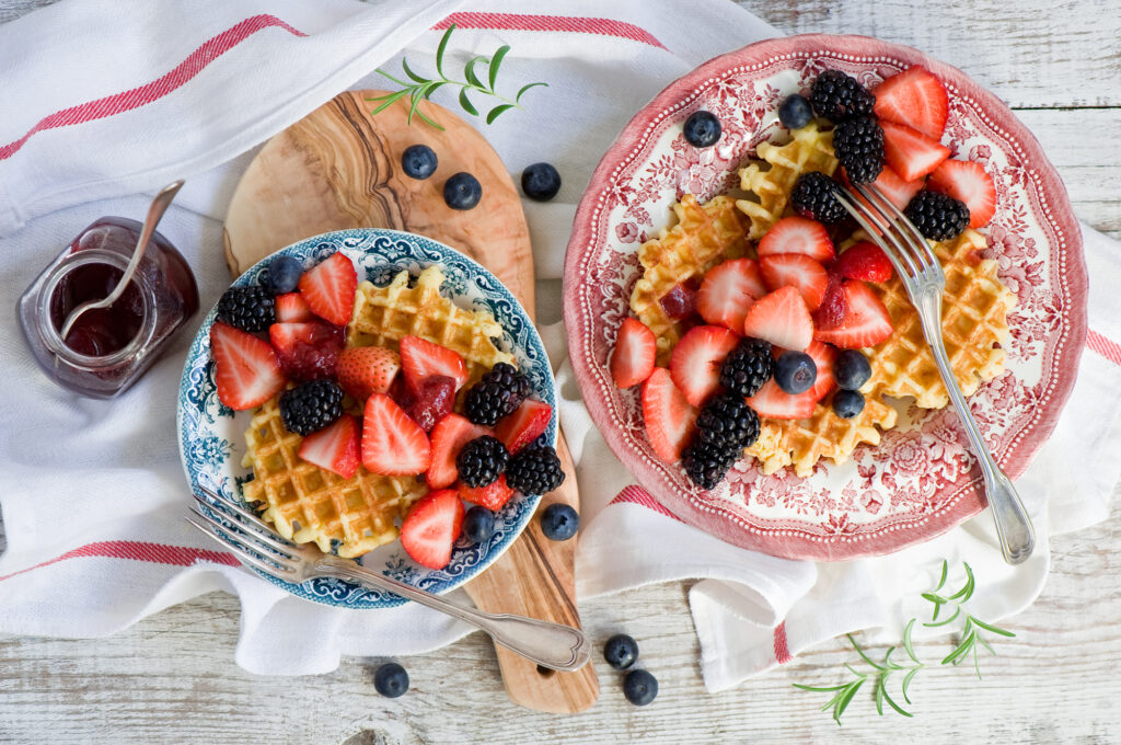 Charming Breakfast Spread: Waffles, Berries & Rustic Elegance Wallpaper