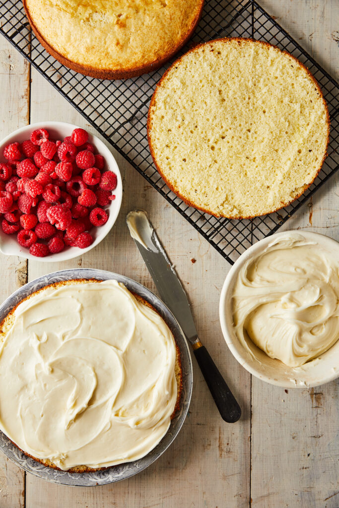 Delightful Cake-Making Wallpaper with Cream & Raspberries