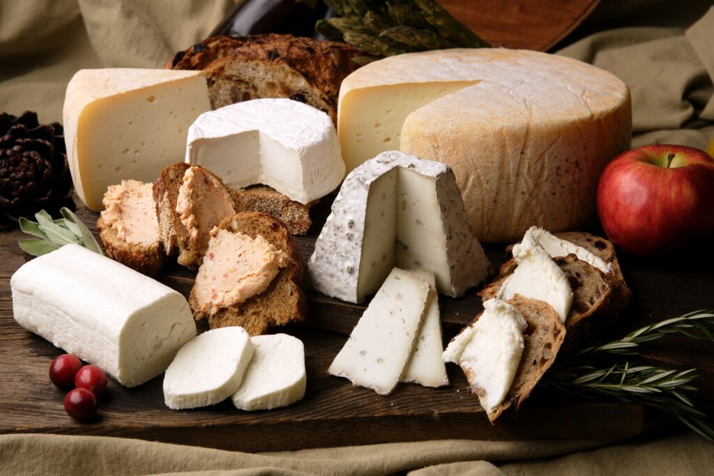 Delicious Cheese Assortment Wallpaper: Creamy, Textured & Fresh
