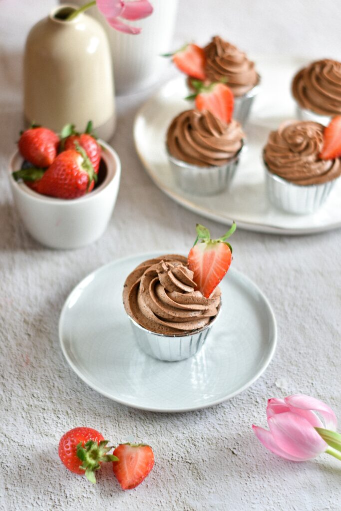 Delicious Chocolate Cupcake Wallpaper with Fresh Strawberries