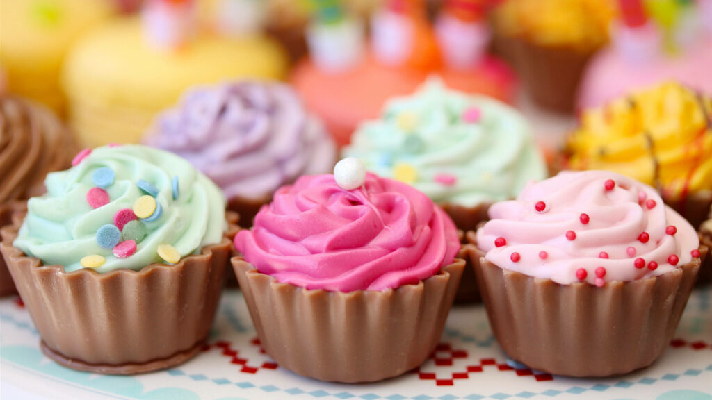 Colorful Cupcake Delights: A Tempting Feast for the Eyes in Desktop Wallpaper Form