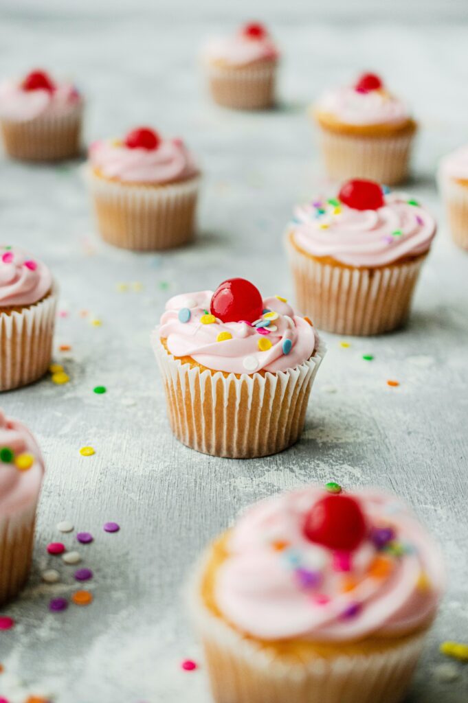 Sweet Cupcake Wallpaper: Colorful Decorated Treats & Festive Design