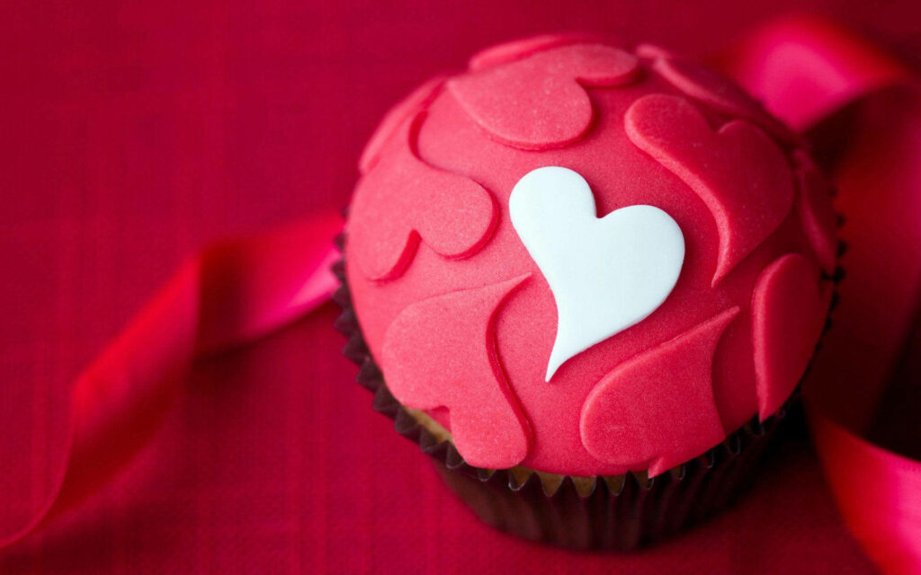 Vibrant Red Cupcake with Fondant Hearts | Wallpaper Background