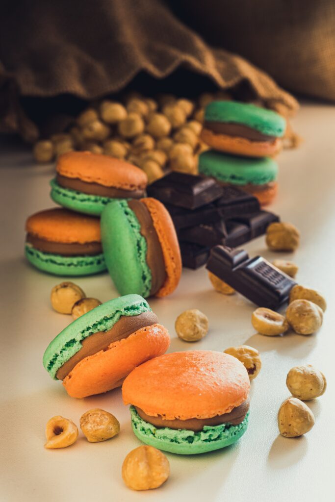 Colorful Macarons & Cookies: Tempting Dessert Wallpaper Background