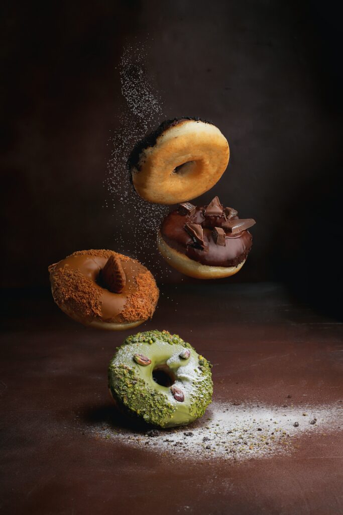 Delicious Donut Wallpaper: Colorful Toppings & Sprinkles Delight!
