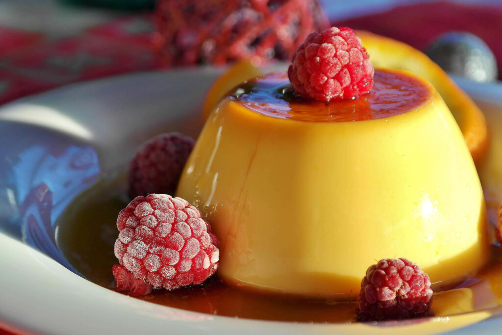 Delightful Flan Dessert with Raspberries - Wallpaper Background