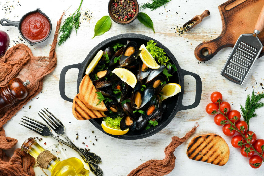 Delightful Mussels Wallpaper with Fresh Ingredients on Rustic Table