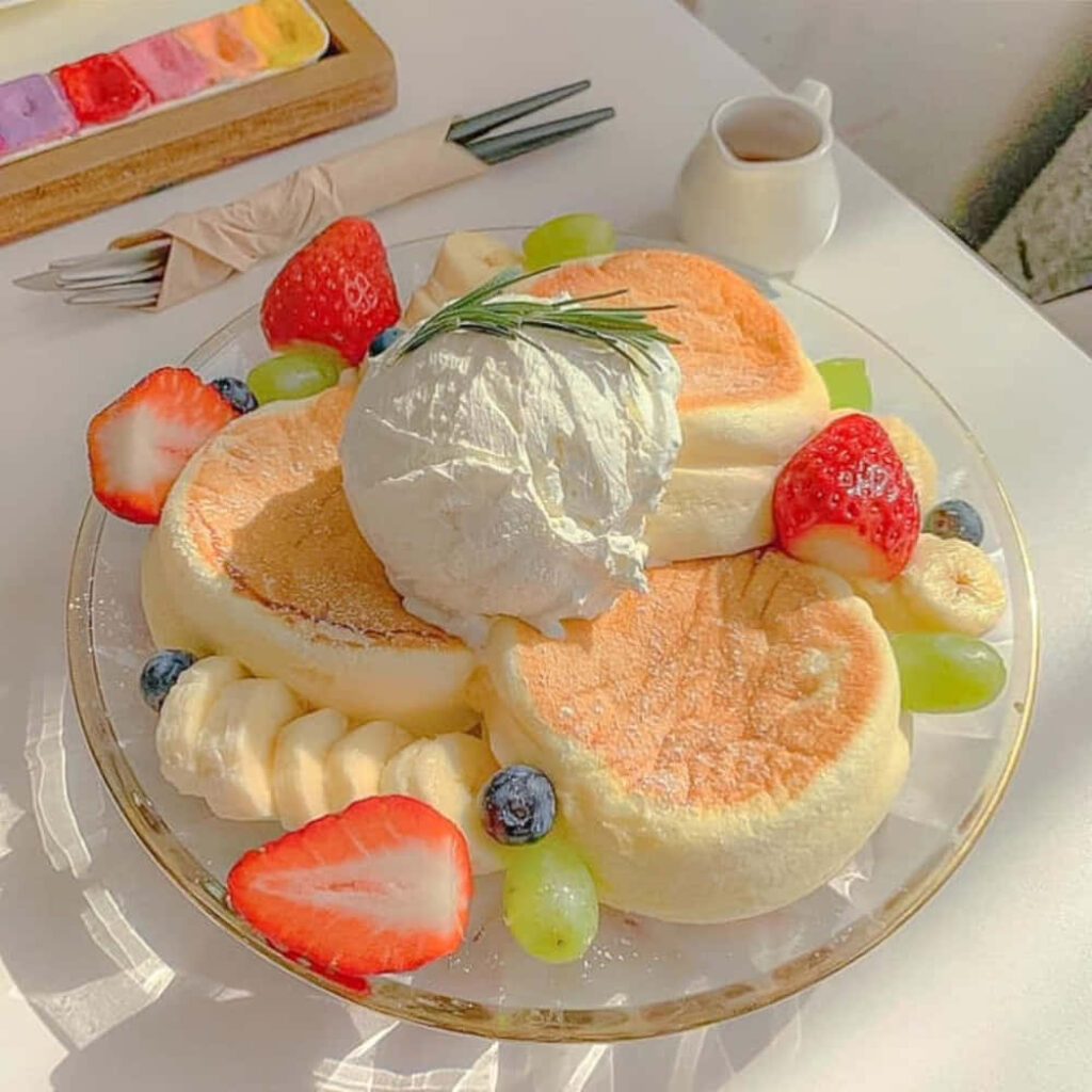 Delicious Fluffy Pancakes with Ice Cream & Fresh Fruits Wallpaper