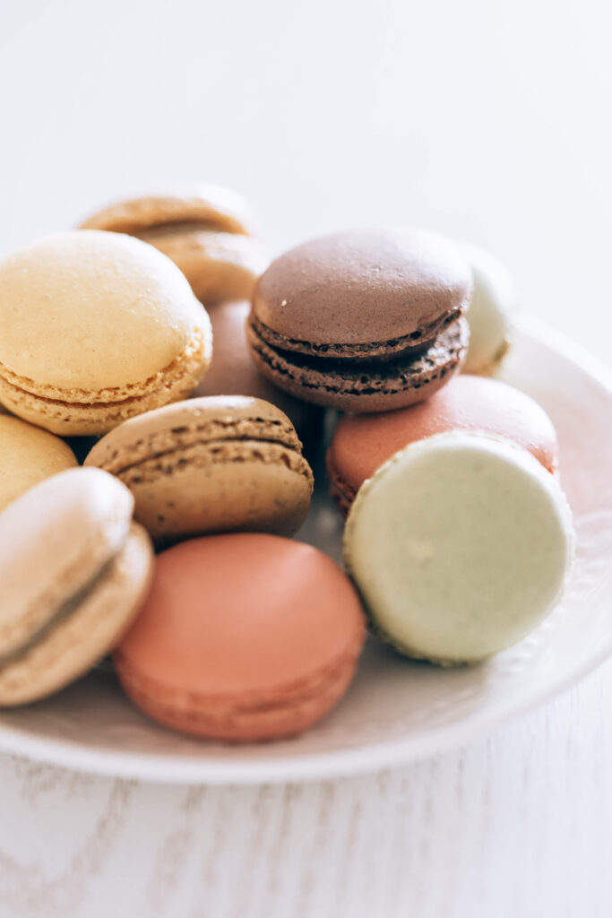 Pastel Wallpaper: Elegant Macarons on White Plate - Sweet Aesthetic