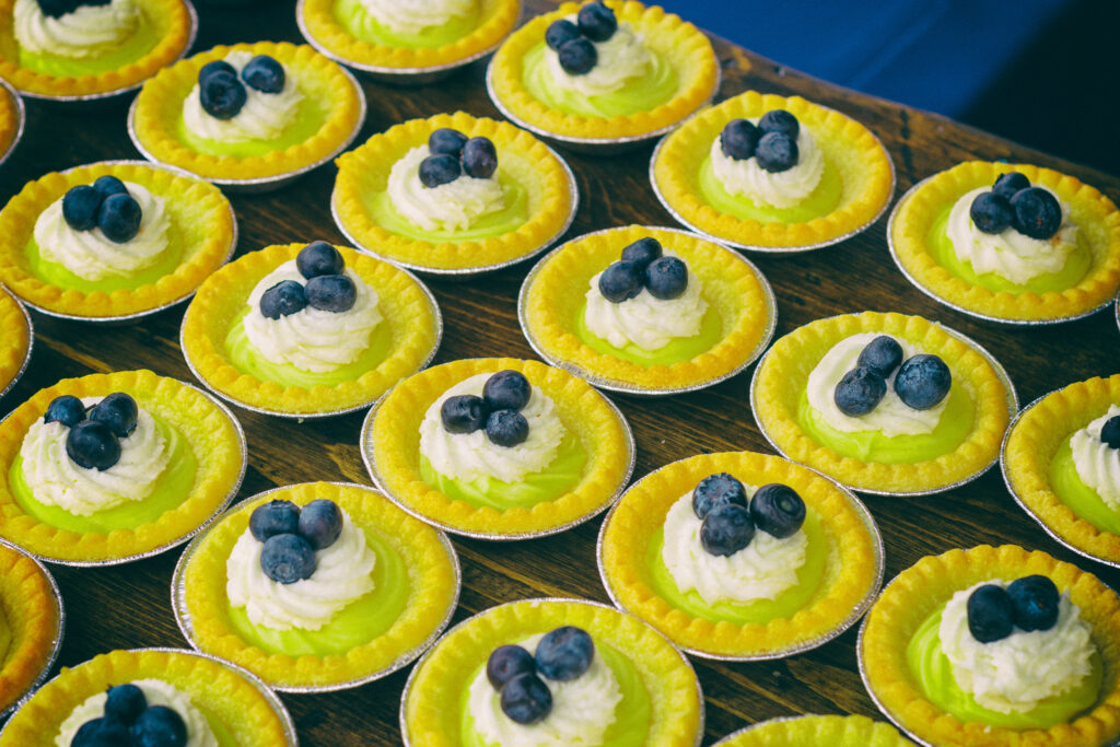 Appetizing Tartlets with Whipped Cream & Blueberries Wallpaper Background