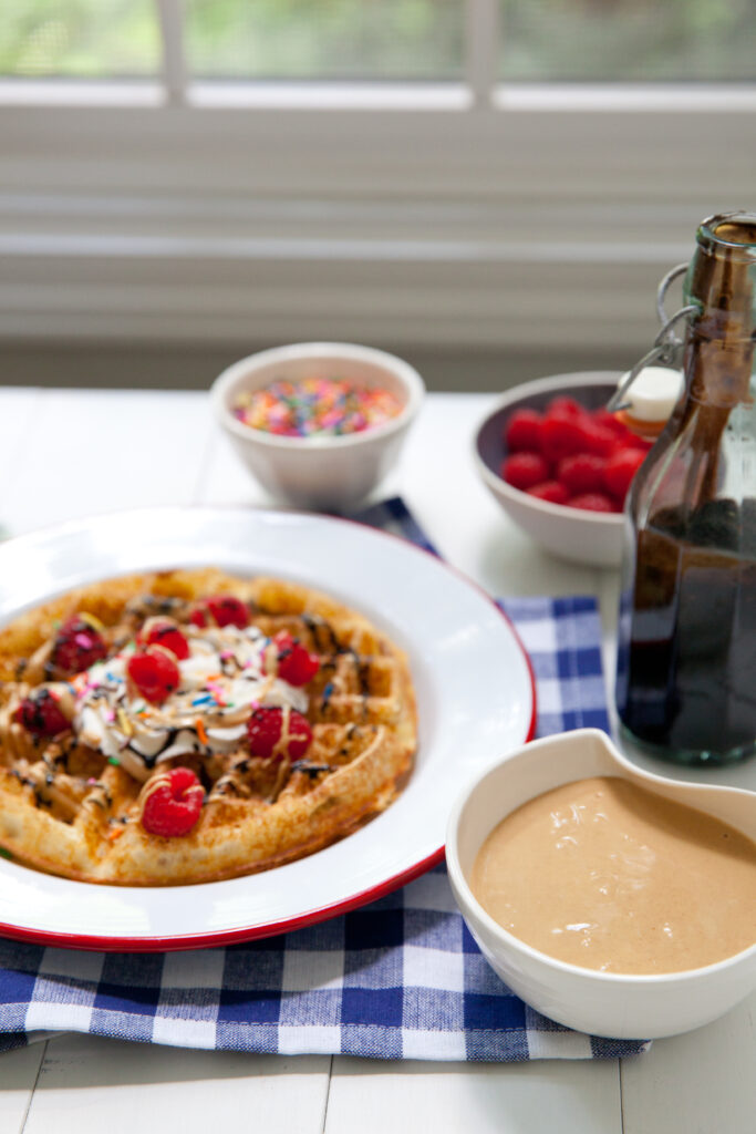 Delicious Waffles with Whipped Cream & Raspberries – Wallpaper Background