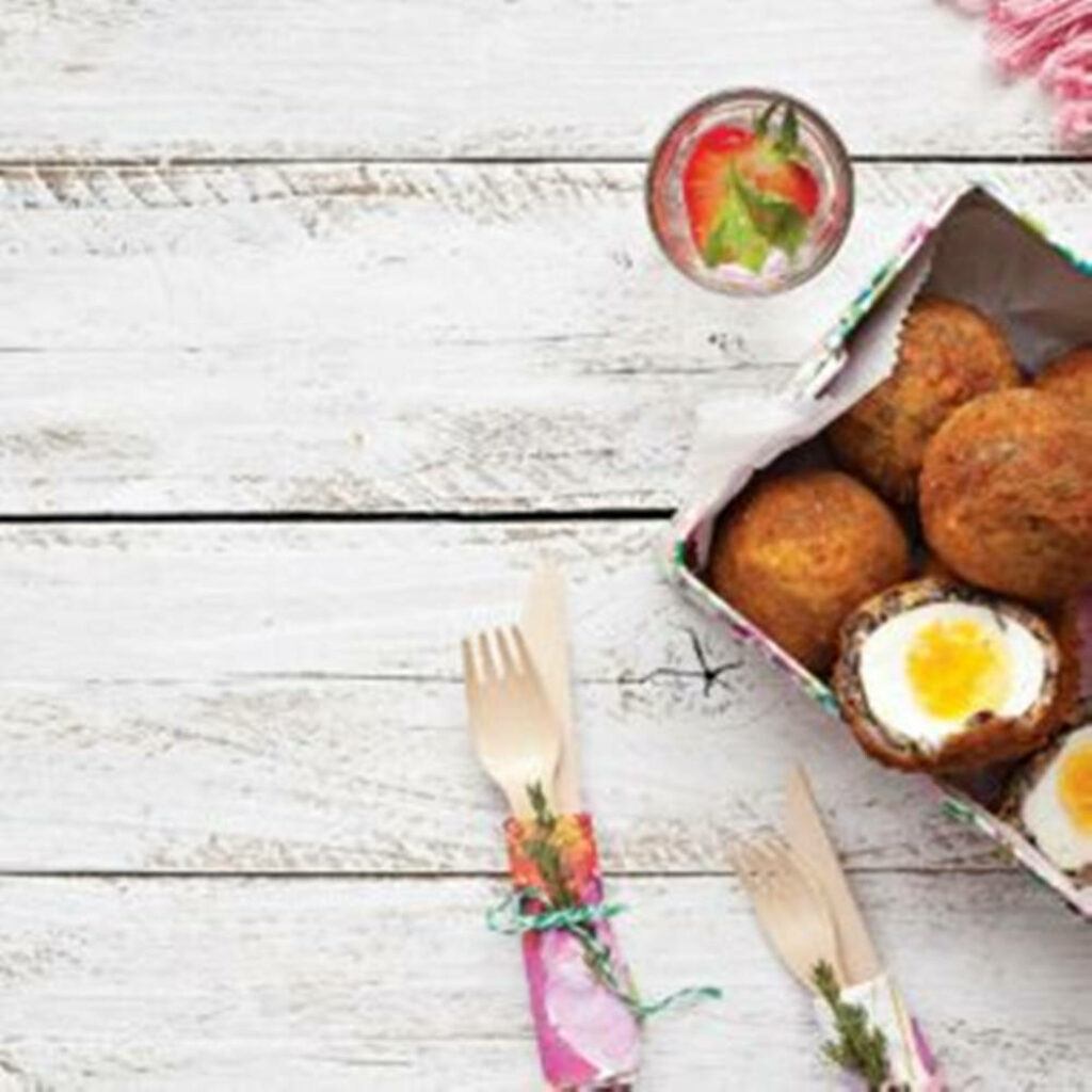 Rustic Wallpaper: Golden Scotch Eggs & Vibrant Cutlery Delight