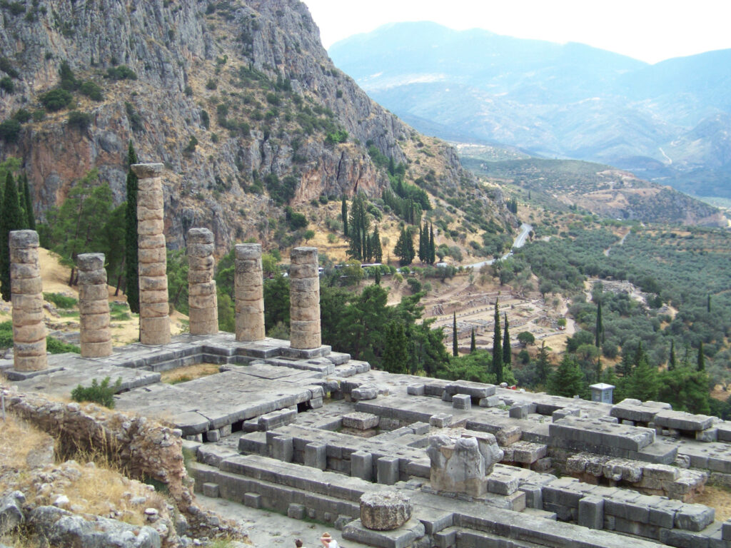Stunning Delphi Tholos Wallpaper: Ancient Ruins & Greek Landscape