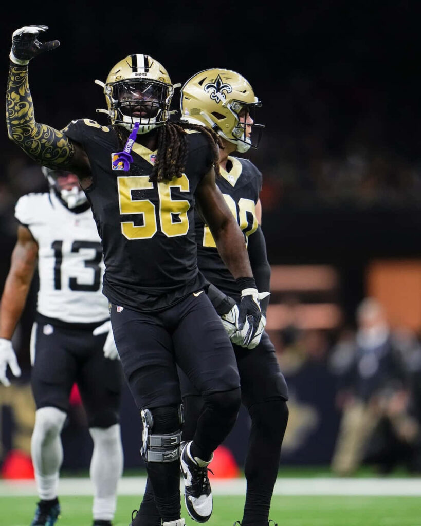 Demario Davis New Orleans Saints number 56 celebrating in black and gold uniform on field Wallpaper