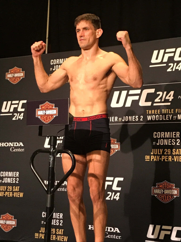 Demian Maia UFC 214 weigh-in focused expression athletic physique bright lighting MMA event Wallpaper