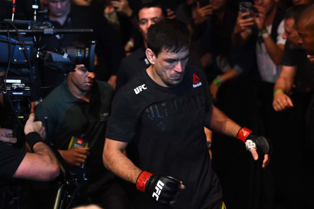 Demian Maia walking to octagon UFC Fight Night intense focus fans cameras dramatic lighting wallpaper
